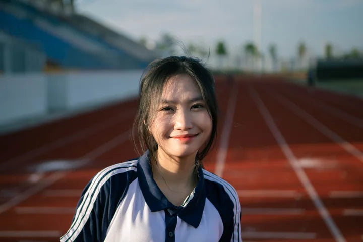 Woman running outdoors as part of an active routine